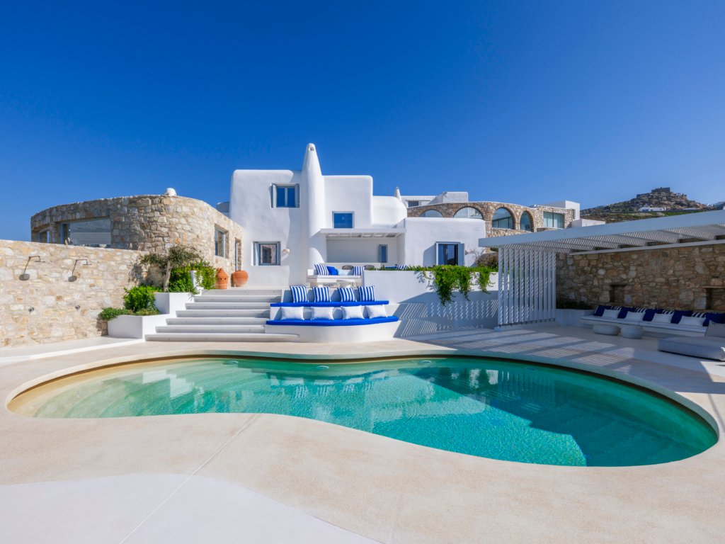 Villa Kiya curved pool and whitewashed Cycladic house in Kanalia, Mykonos