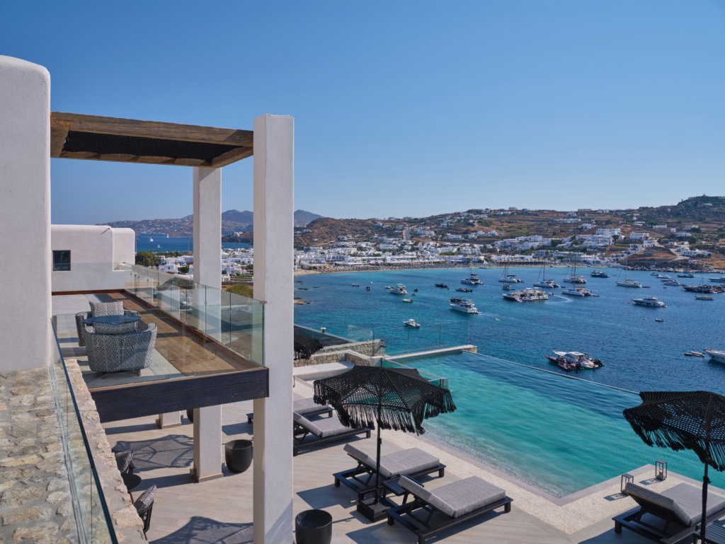 Villa Aegeas terrace and infinity pool overlooking the bay in Ornos, Mykonos